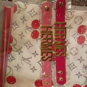 Source Unknown Pink and Red Leather Belts